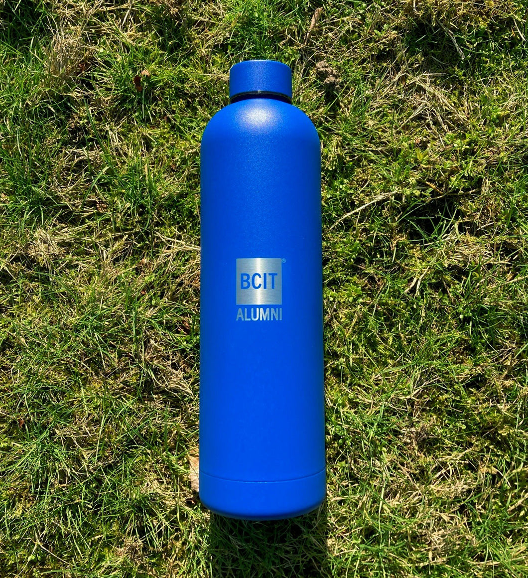 BCIT Alumni silver logo against a blue BCIT Alumni Head Honcho Insulated Water Bottle